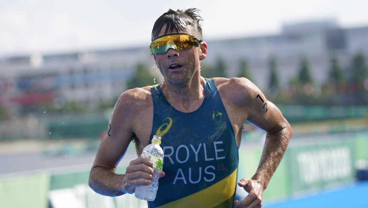 ON THE RUN: Newcastle triathlete Aaron Royle in the Olympic men's race at Tokyo on Monday. Picture: AP Photo/Jae C. Hong