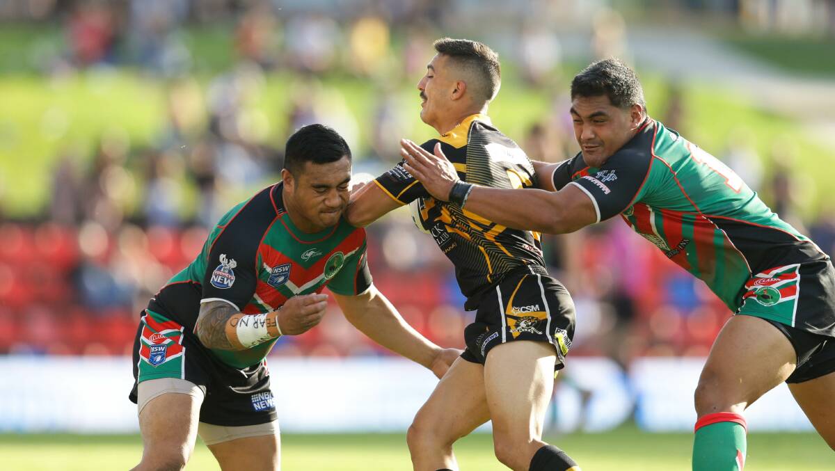 HIT: Last year's Newcastle Rugby League grand final between Western Suburbs and Cessnock. Picture: Jonathan Carroll 