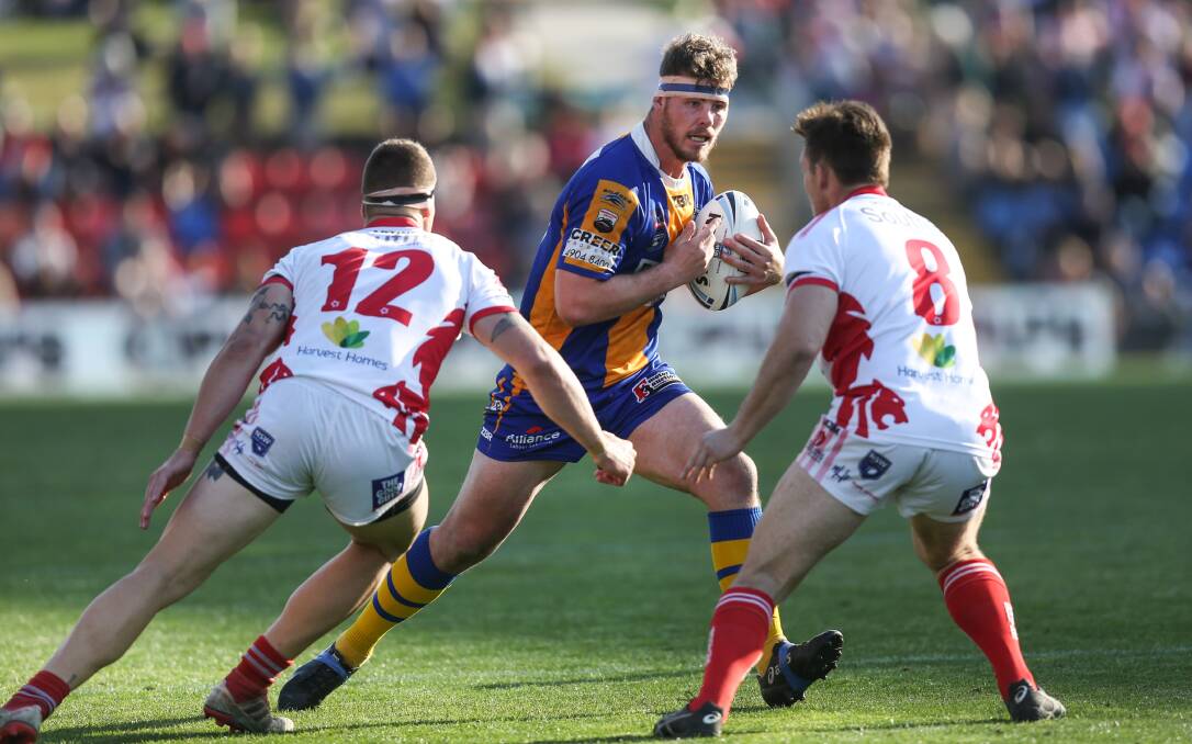 HANGING UP THE BOOTS: Shaun Boss playing for Lakes in the 2018 Newcastle Rugby League grand final. The 32-year-old prop will play his last game for the Seagulls this weekend. Picture: Jonathan Carroll