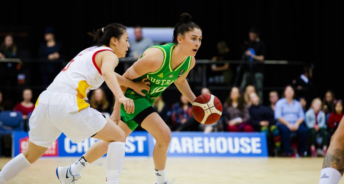 GREEN AND GOLD: Katie Ebzery representing Australia against China last month. Picture: Jamila Toderas