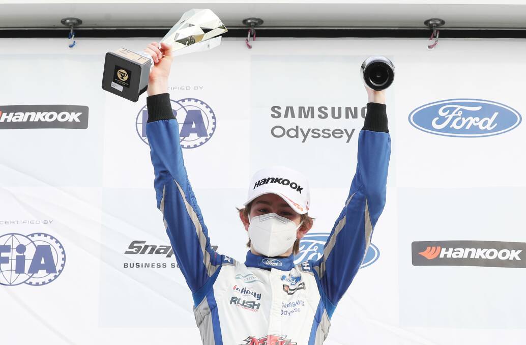 SWEET SUCCESS: Christian Mansell on the podium following his first win. Picture: Jakob Ebrey Photography