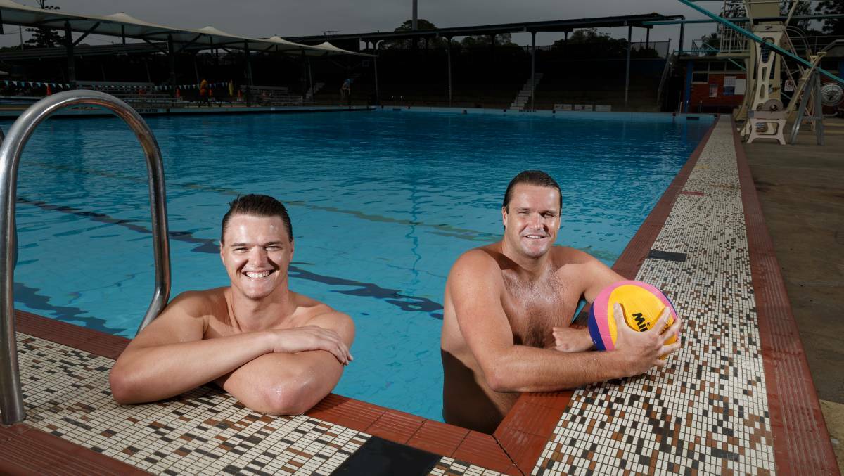 TICKET TO TOKYO: Australian water polo representatives Nathan Power and Richie Campbell at Lambton Pool last year. Picture: Max Mason-Hubers