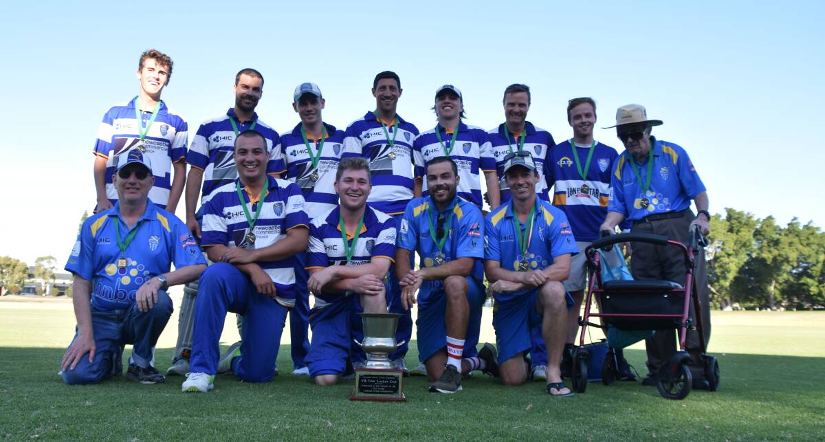 VICTORY: Hamilton-Wickham with the Tom Locker Cup trophy at No.1 Sportsground on Sunday after defeating University by four wickets in the Newcastle one-day final for 2018-19. Picture: Josh Callinan