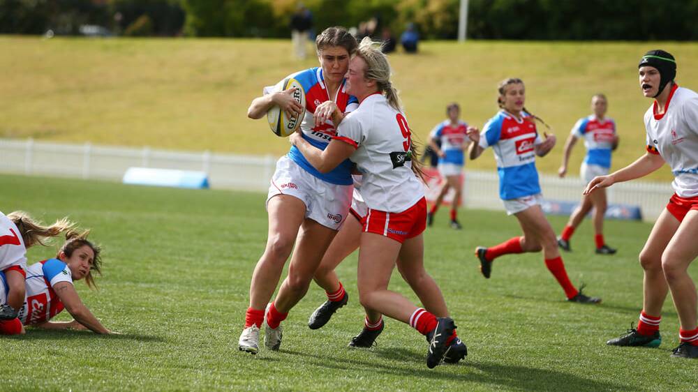 TACKLE: Hunter Rugby Union's women's team in action at the NSW Country Championships on Saturday. Picture: Josh Brightman | Balanced Image Studio