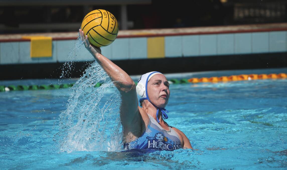HOPEFUL: Hunter Hurricanes player Jane Moran in action at Lambton Pool last month. The women's squad won't know if they have made their maiden national finals series until April 28. Picture: Marina Neil