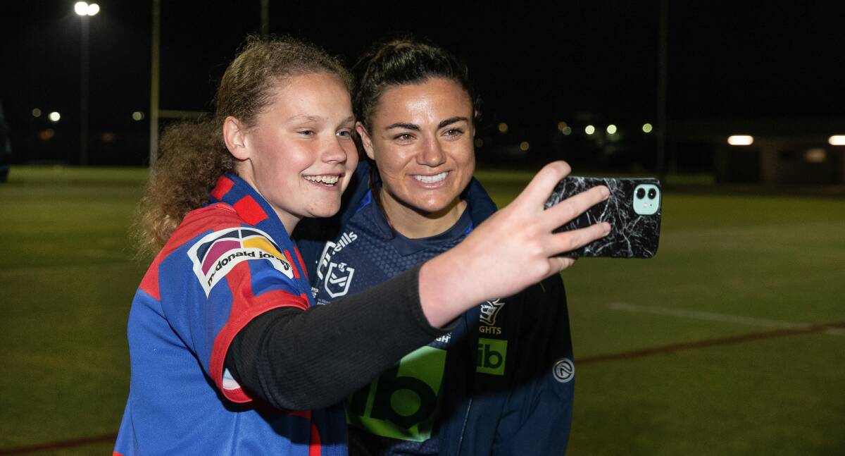 Newcastle captain Millie Boyle (right) with Knights fan Mia Wallace earlier this week. Picture by Marina Neil
