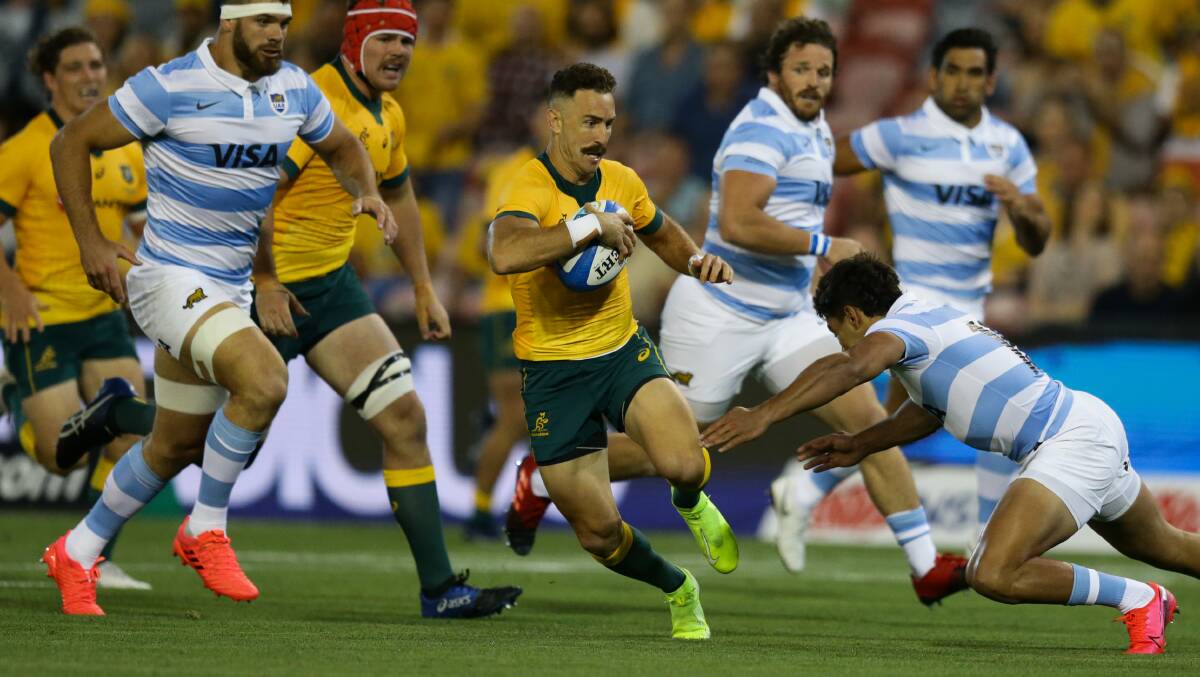 HOME: Nic White makes a break for the Wallabies on Saturday night. Picture: Jonathan Carroll