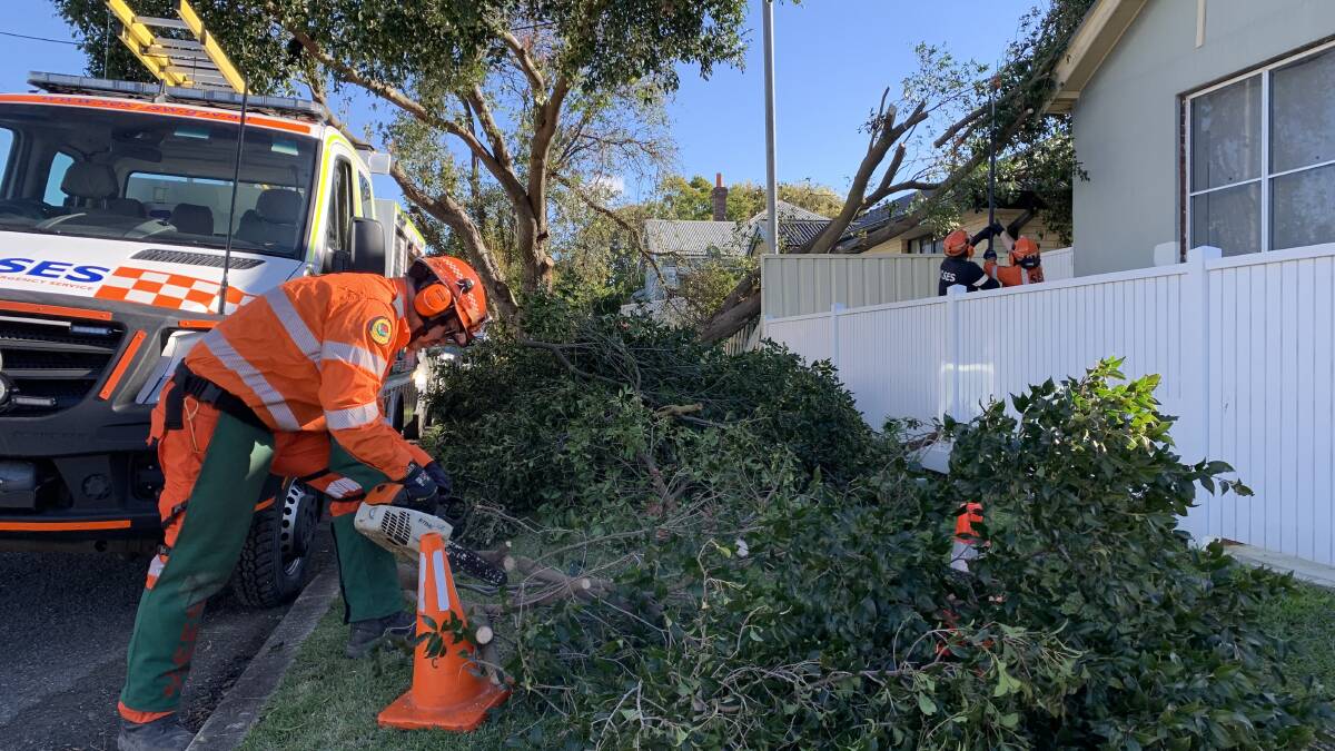 UNDER THE PUMP: SES crews across Lake Macquarie and Newcastle have been inundated with calls for help. Picture: Simone De Peak 