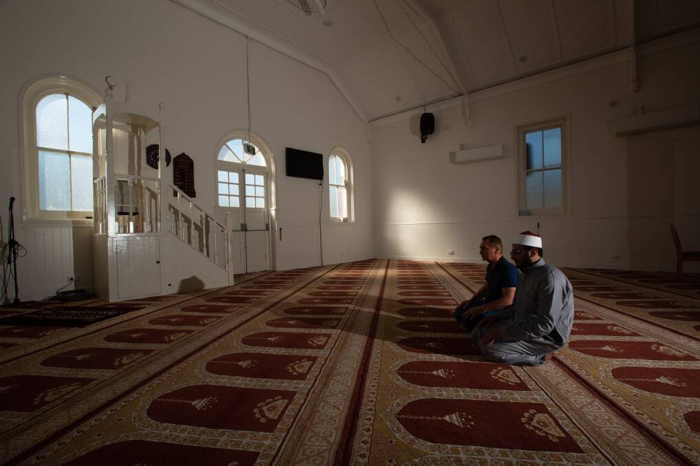 Mayfield Mosque president Yunus Kara and Imam Mohamed Hamed sit in quiet prayer for the victims of the Turkey and Syria earthquakes that have claimed thousands of lives. Picture by Jonathan Carroll.