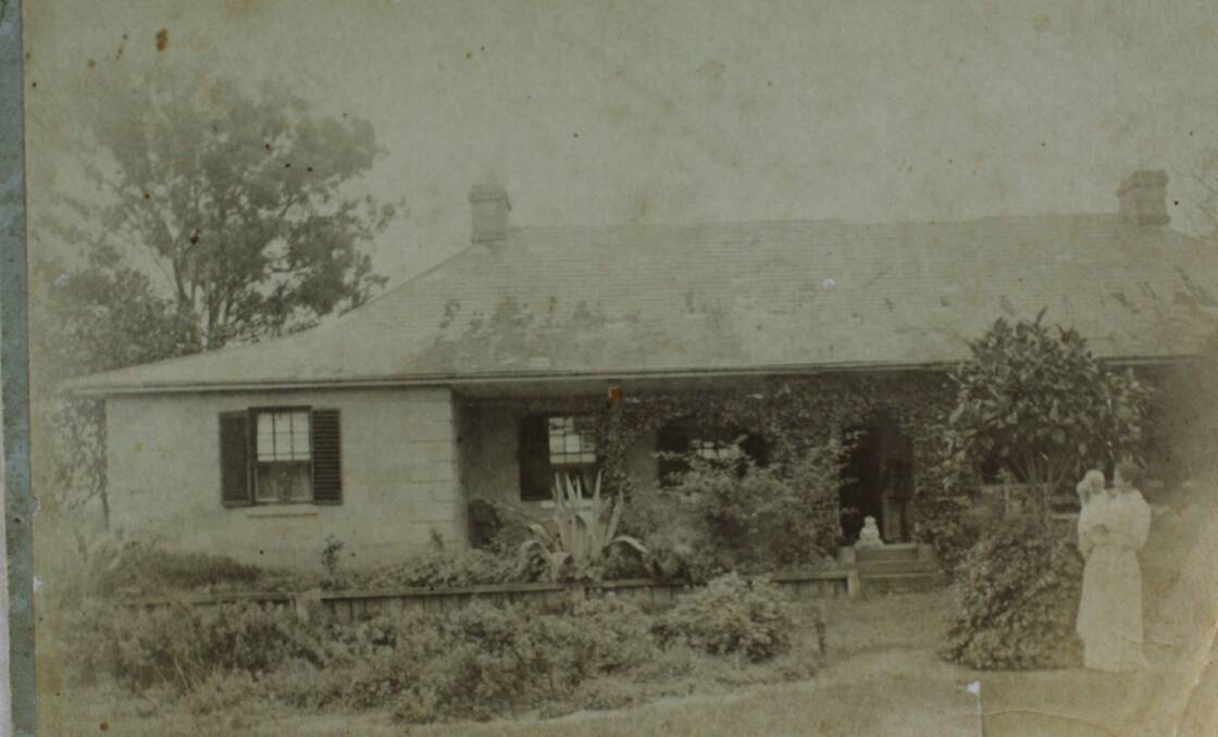Ravensworth Homestead around 1894. Picture shows one time owner Mrs Hill holding a baby. 