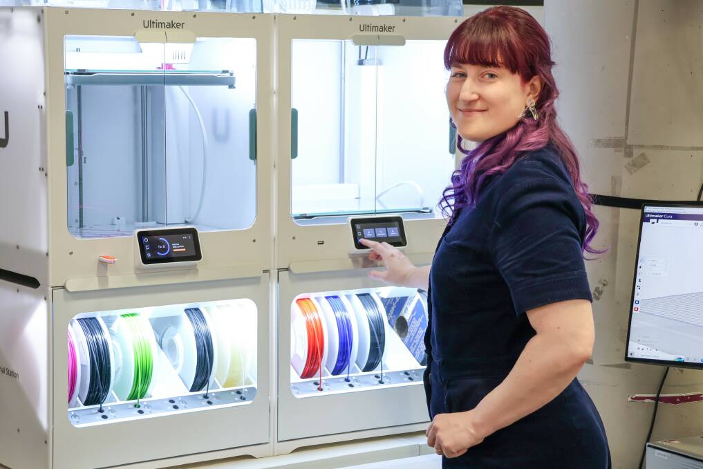 FAB LAB: The council's Smart Cities lead Claire Chaikin-Bryan uses the 3D printer. Picture: Supplied
