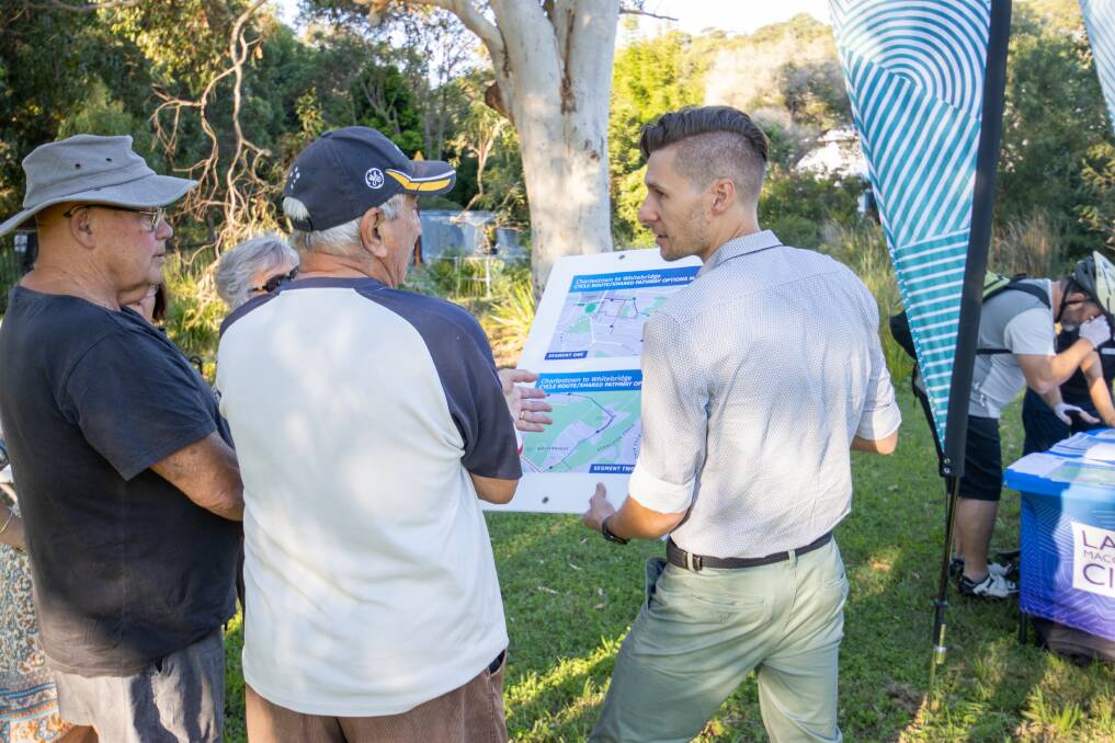 WHEELS IN MOTION: The council's transport operations lead Rob Morris discusses options with locals. Picture: Supplied