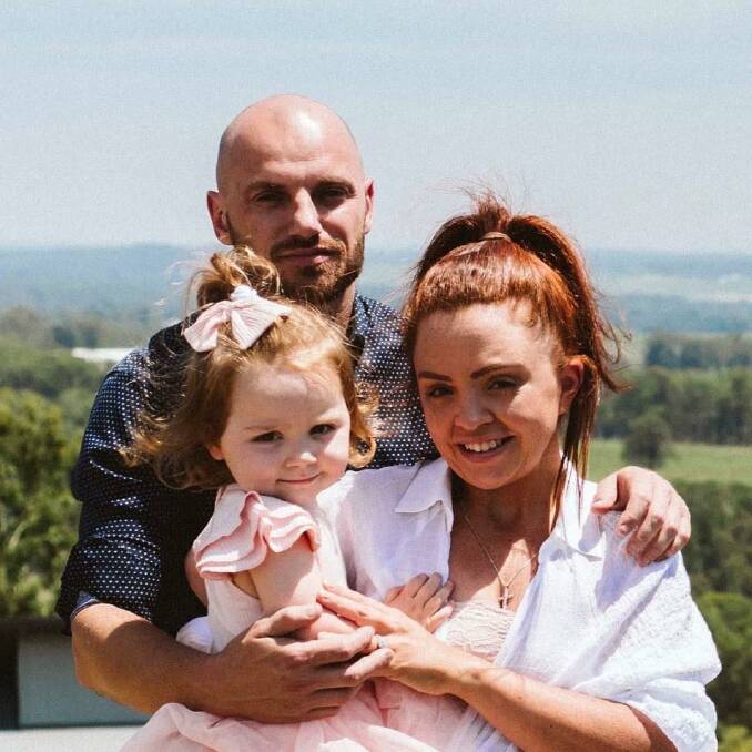 Steve Oliver, Sheridan Hopkins and their daughter Arabella. The couple were engaged in November 2020. Picture supplied.