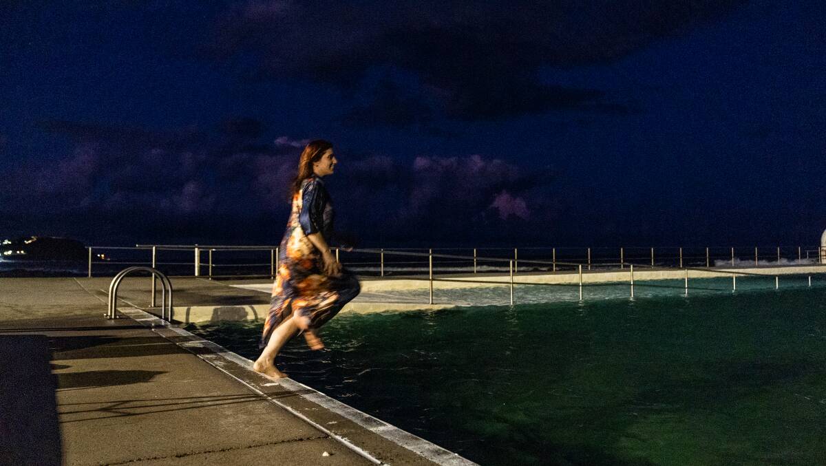 A What Were You Wearing? member jumps into the baths. Picture supplied 
