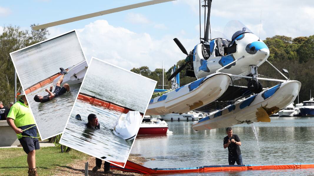 The boat being craned out of Lake Macquarie after the pilot (inset) jumped in the water to pull it upright. Pictures by Peter Lorimer 