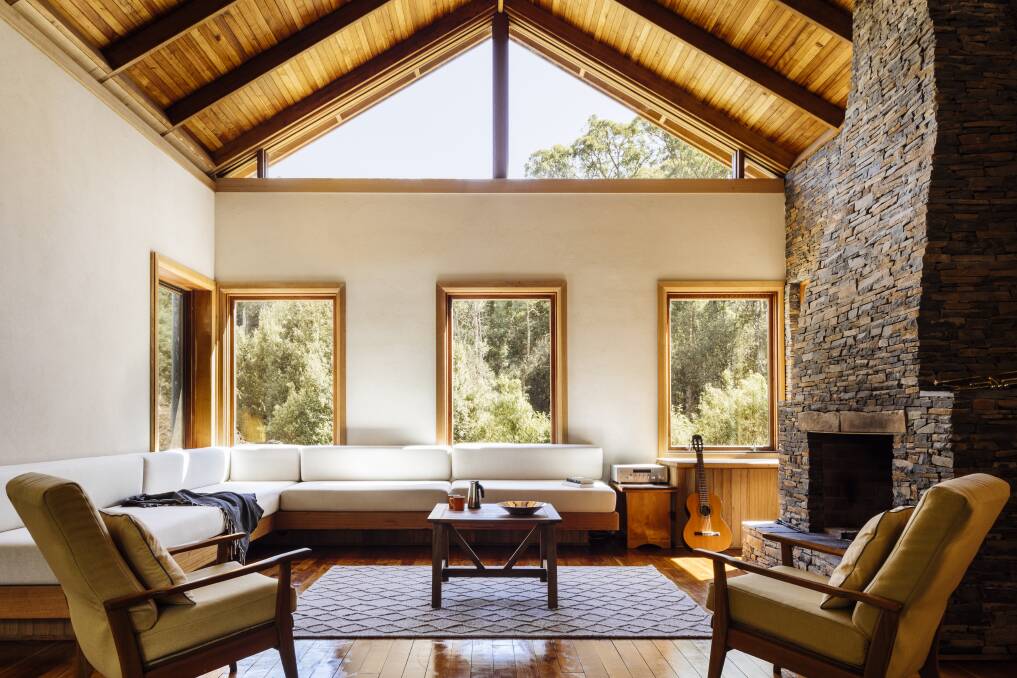 In strong gabled gestures, ridge beams rise to meet large format windows, and clerestory openings capture treetops and sky. Photo: Adam Gibson