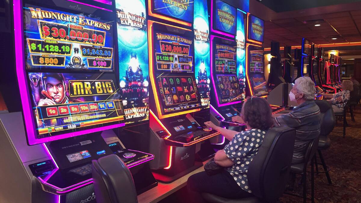 Pokies cause pain, but are cashless cards a panacea for gambling?