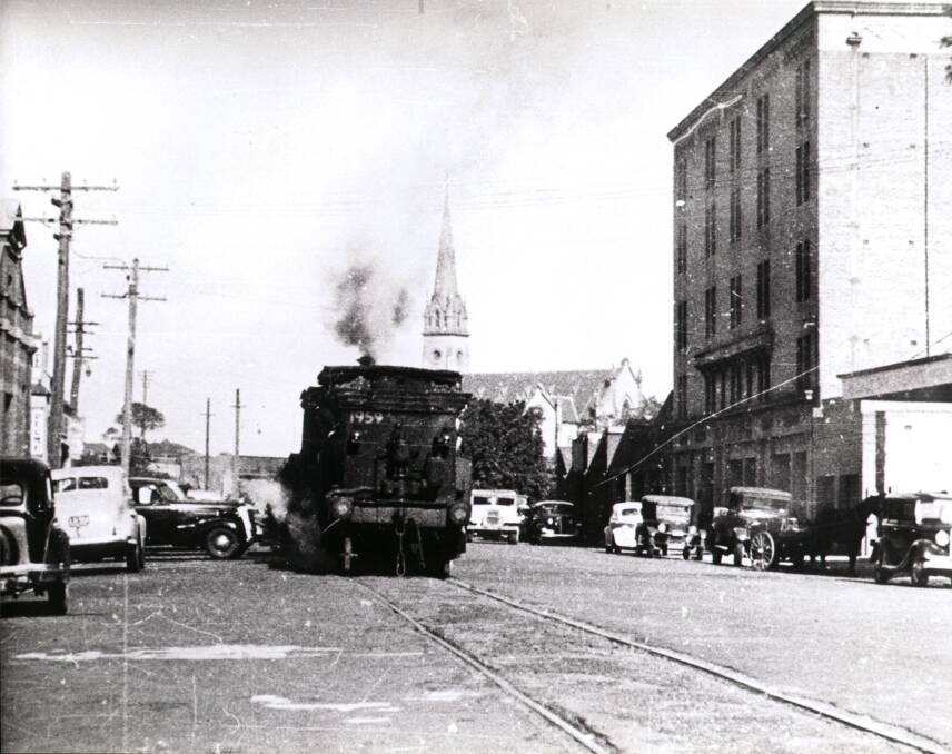 PULLING POWER: A steam locomotive in Burwood Street, Merewether. Reader Peter Devey says it and other old train lines represent a missed opportunity for Newcastle.