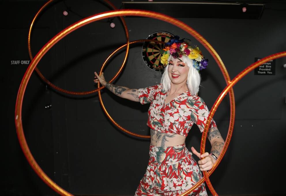 IN A SPIN: Professional hulahoop artist Hannah Indigo shows off her skills on Sunday. Picture: Peter Lorimer