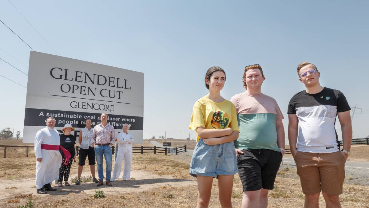 OVERRULED: Father Rod Bower, Louise ihlein, Janet Murray, Dr Liam Phelan, Kerry Bower, Luka McCallum, Sean Bryant and Campbell Knox have opposed the mine's expansion. Picture: Max Mason-Hubers