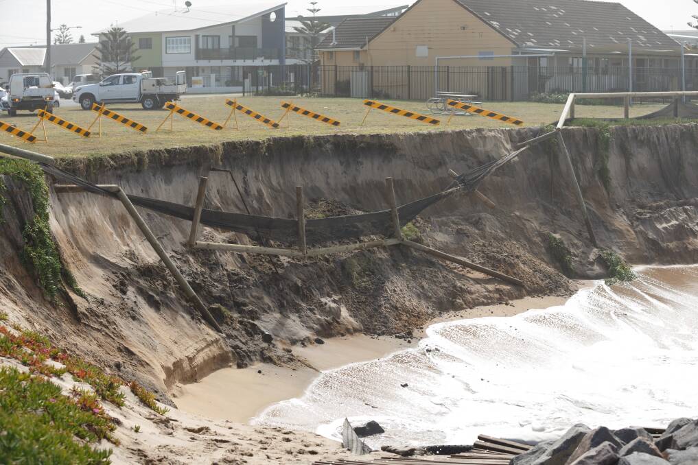 AT RISK: Stockton's shoreline is back in the firing line, City of Newcastle says. A crane will begin emergency sandbagging work on Saturday morning. Picture: Max Mason-Hubers