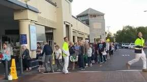 Elderly Hunter shoppers queue long before dedicated shopping hour