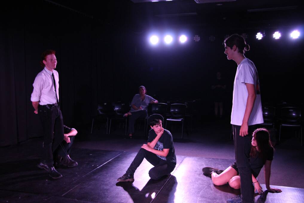 IN CAHOOTS: The cast of Cahoot's Macbeth during a rehearsal. The play's two acts are performed in different rooms.
