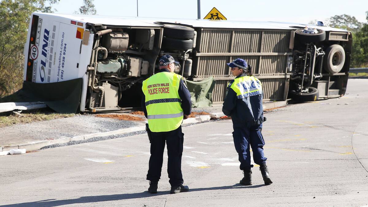 Police at the crash scene on Monday. Picture by Peter Lorimer