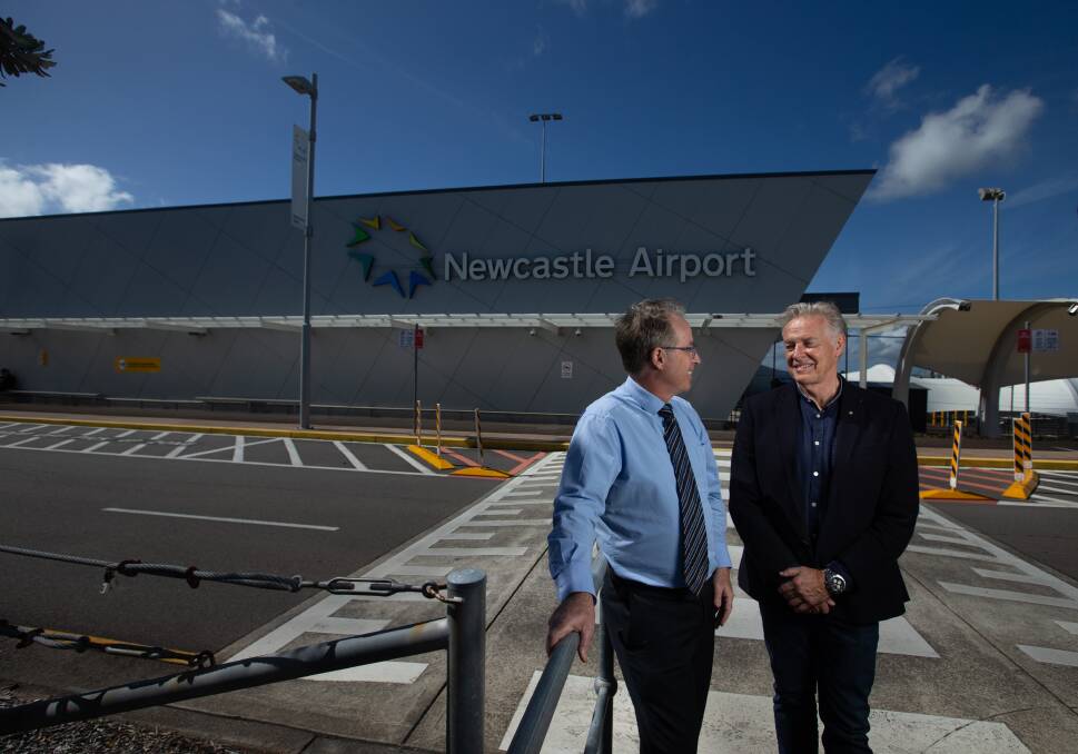 ON SONG: Airport CEO Dr Peter Cock and Hunter Defence's Tim Owen. The Infrastructure Australia report flags transport and defence as Hunter strengths. Picture: Marina Neil