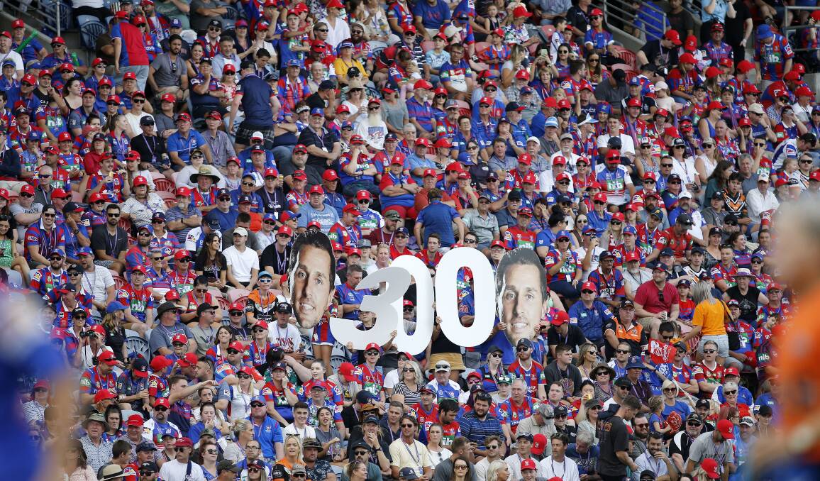 MAKE SOME NOISE: A large crowd turned out on Sunday to celebrate Mitchell Pearce's 300th NRL match.