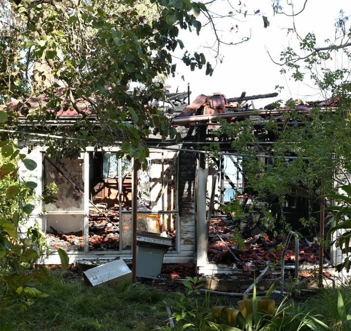 GONE: The early morning fire completely destroyed the weatherboard property, which neighbours said had stood empty for several years. Two adjoining neighbours were forced to evacuate for their own safety. Picture: Simone De Peak