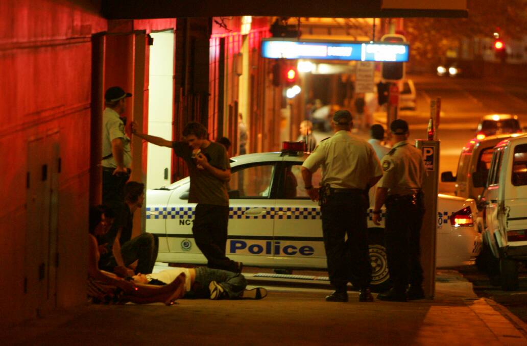OLD DAYS: Police, pictured on the beat in Newcastle in 2008 before the lockouts, will be among the workers to bear any cost of winding back the alcohol rules. 