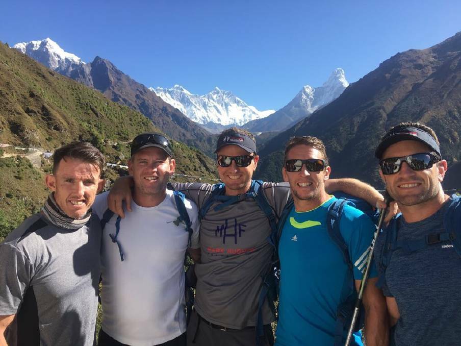 LAST TIME: Steve Crowe, Matt Gidley, Mark Hughes, Kurt Gidley and Danny Buderus during their fundraising trek up to Everest basecamp in 2018. 