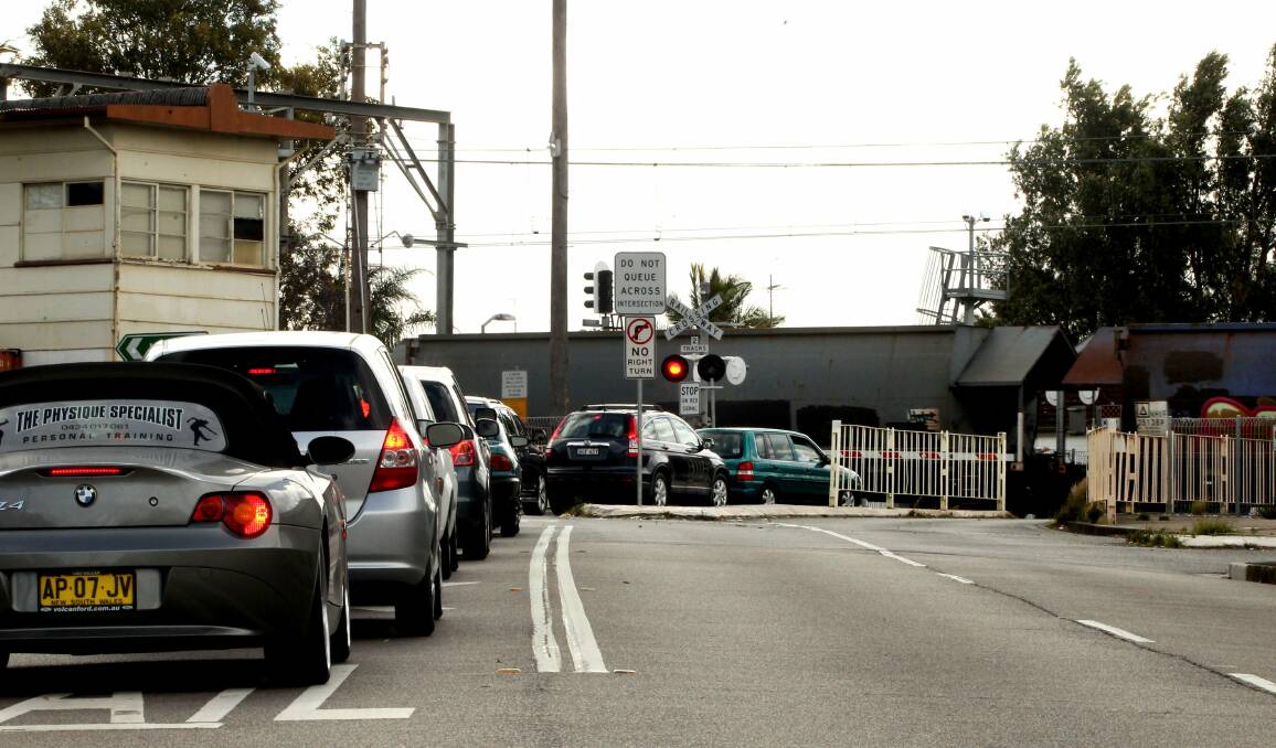 LEVELLED: The government flags removing level crossings to speed up train travel between the Hunter and Sydney. Splitting freight and passenger rail has long been mooted as an Adamstown gates congestion fix. 