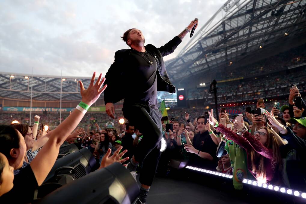 NATIONAL ANTHEMS: One Republic at Sunday's NRL grand final. Reader Graeme Kime argues that Australian acts are a better option for major sporting events. 