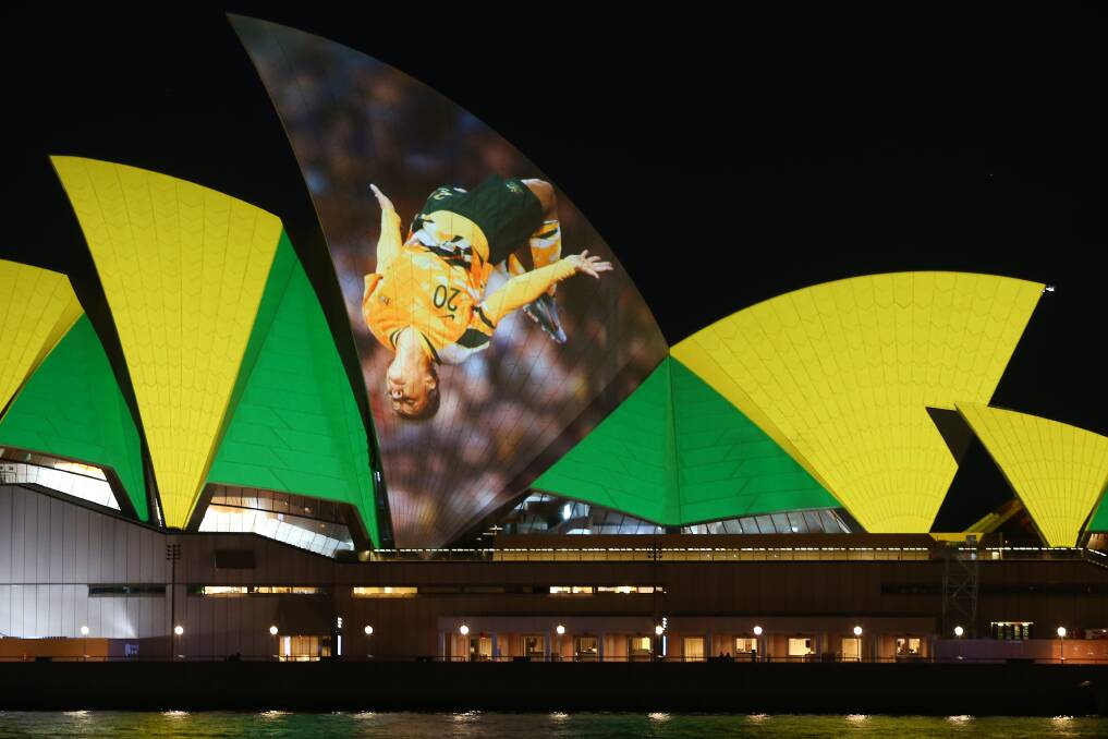 VISIBLE: The green and gold of Australian and a back-flipping Sam Kerr were emblazoned onto the Sydney Opera House on Thursday night. Picture: Getty Images