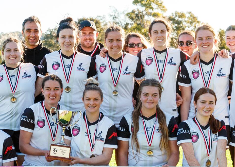 Keelan Hamilton, pictured second from the left in the back row at the Northern NSW Football Women's State Cup last year, will coach Maitland again in NPLW NNSW next year. Picture by Max Mason-Hubers