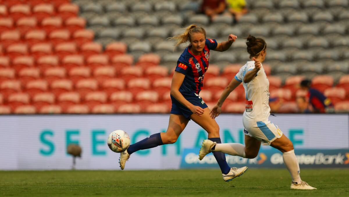 KEY PLAYER: Long-serving Jets striker Tara Andrews in action during last W-League season. Picture: Jonathan Carroll