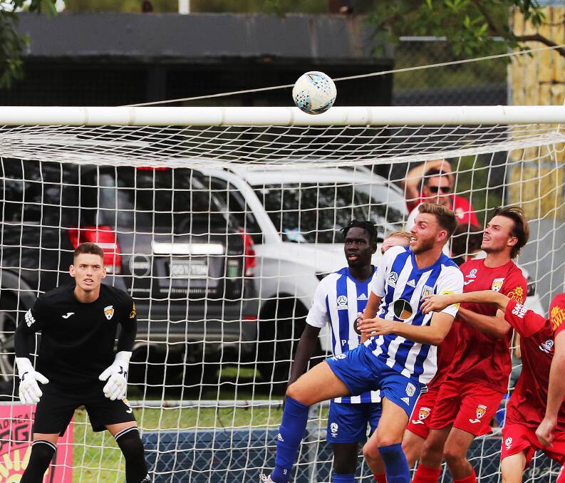 MIXED START: Newcastle Olympic, in action during round two, opened their season with a 2-1 win against Broadmeadow before going down 3-1 to Charlestown. Picture: Peter Lorimer
