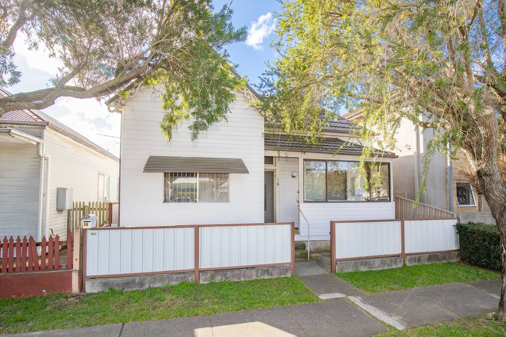 This three-bedroom house in need of work and set on 236 square metres of land at 16 Buchanan Street, Hamilton attracted 13 registered bidders and sold under the hammer for $649,000.
