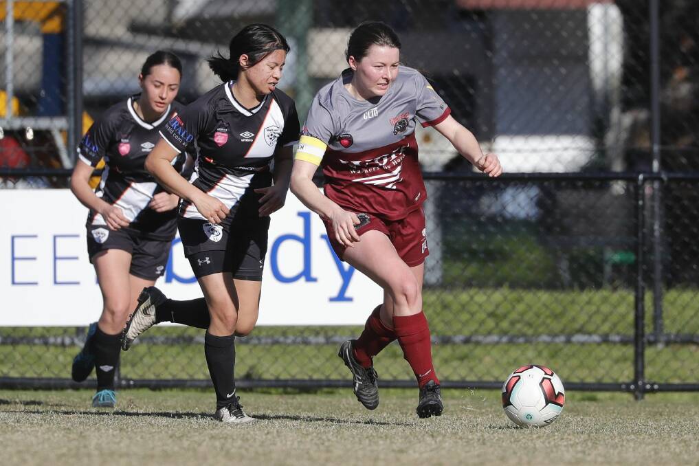 Warners Bay captain and midfielder Elodie Dagg plays the ball in the Panthers' 5-1 win over Mid Coast at John Street Oval on Sunday. Picture: Valentine Sports Photography