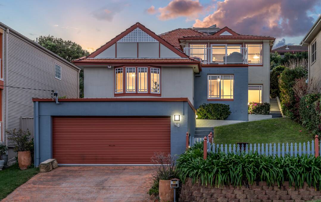 HOTLY CONTESTED: There were eight registered bidders on this Merewether home which sold under the hammer on Wednesday night for $1.1 million.