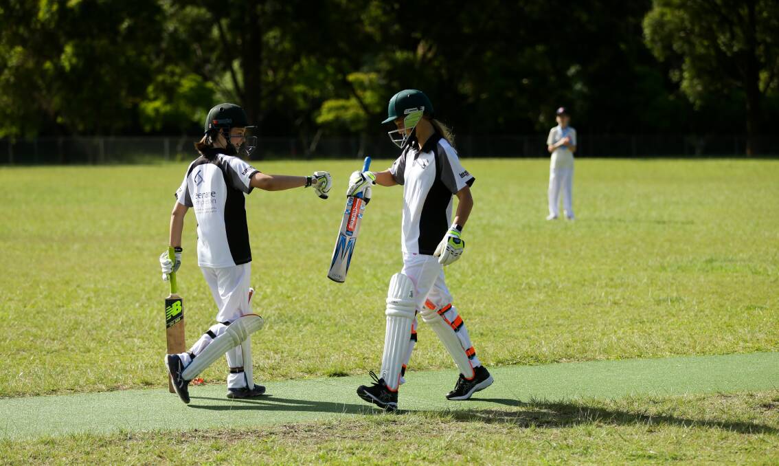 Charlestown players enjoying a game of cricket during the new midweek stage two girls league over summer. Picture: Jonathan Carroll