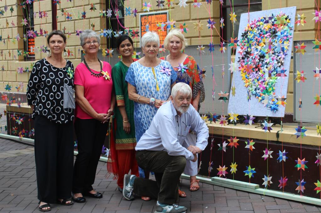 COMMUNITY EFFORT: Anne Kempton, Kate Doran, Hari, Louise Clifton, Barbara Hickling and Bob James worked on the Million Stars project.