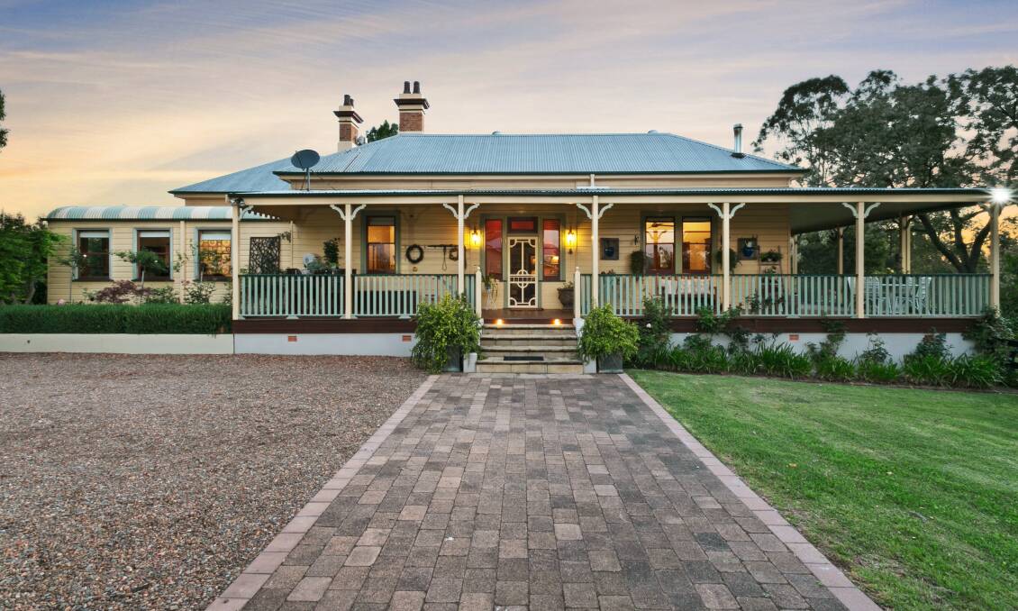 This fine Victorian residence is positioned on two-and-a-half acres of riverfront property in Bolwarra and has a guide of $2.2 million to $2.4 million.