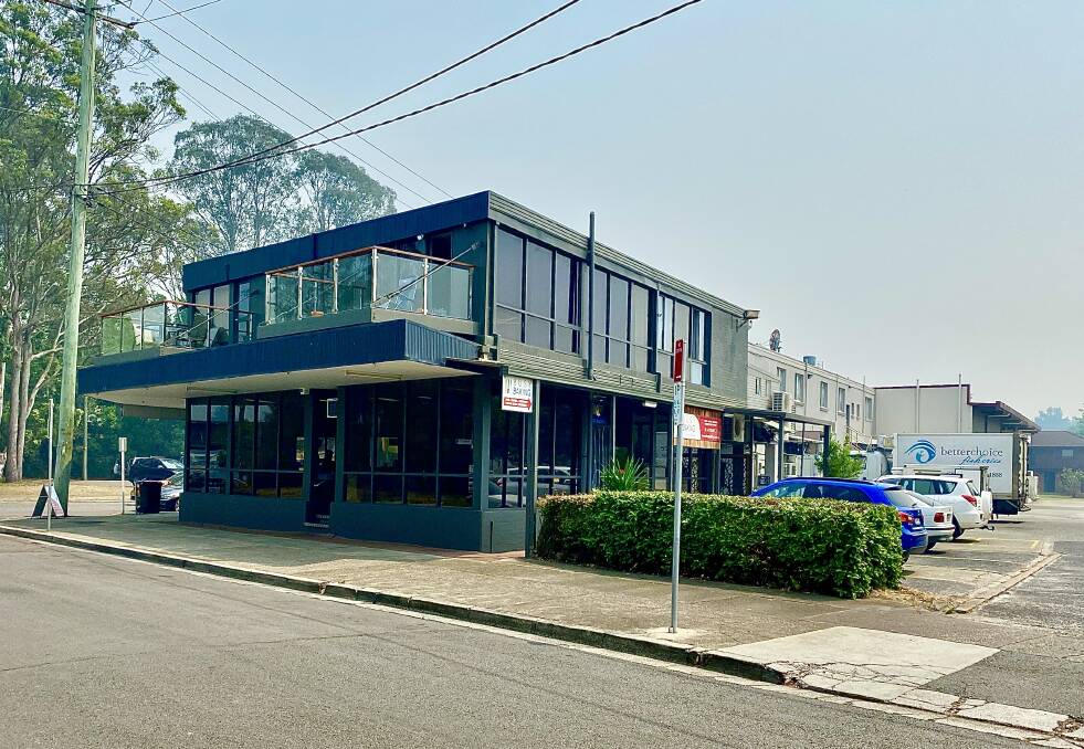 LOTS TO OFFER: This Dora Creek property has income through eight commercial tenancies and six residential flats. It will be sold through openn negotiation auction.