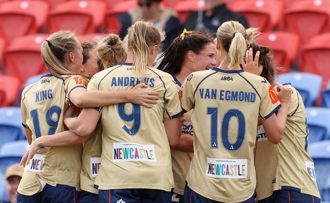 GRINNERS: The Newcastle Jets celebrate Kirsty Fenton's goal in the first half against Wellington Phoenix at McDonald Jones Stadium on Friday. Picture: Getty Images
