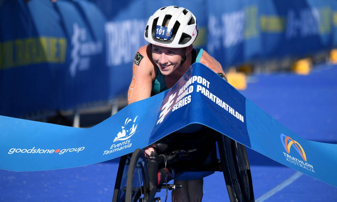 EYE ON THE PRIZE: Newcastle's Lauren Parker, pictured winning the 2020 ITU paratriathlon race in Devonport, Tasmania. Picture: Getty Images