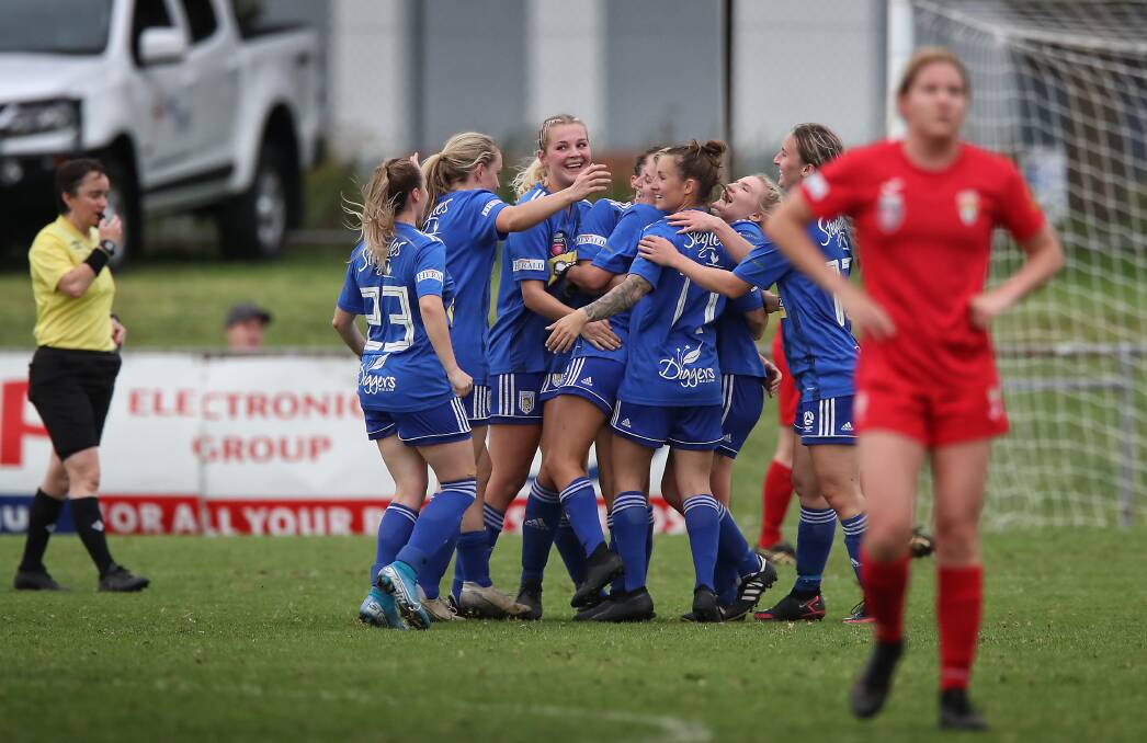 Olympic celebrates a goal against Broadmeadow in round 13 of Herald Women's Premier League at Magic Park on Sunday. Picture: Sproule Sports Focus