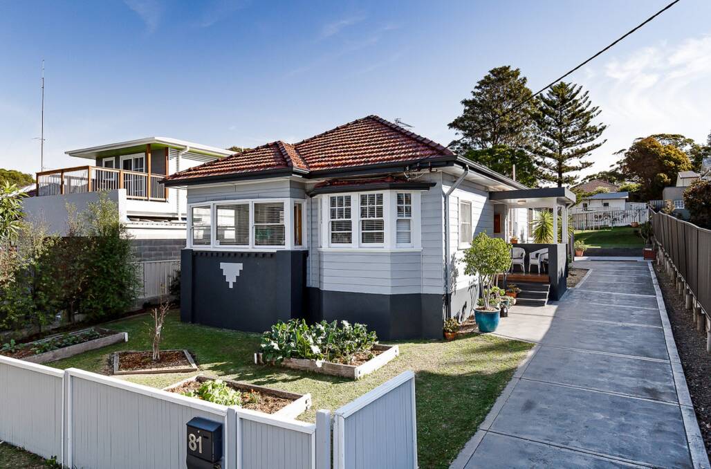 PRICE HIGH: The $750,000 sale of this renovated three-bedroom home in Waratah at an on-site auction last weekend was a record for its street.